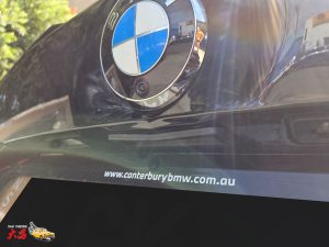 BMW M4 Competition smash repair dent dah cheong sydney badge