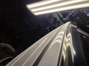 Ford Ranger XLT White Smash repair dents PDR Dah Cheong Sydney damage dent inspection