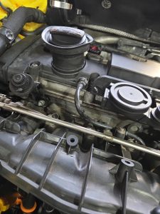 Volkswagen vw golf r spark plug maintenance and body work paint repair dah cheong sydney engine bay