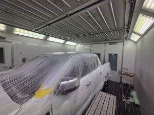 Ford Ranger XLT White Smash repair dents PDR Dah Cheong Sydney work in progress paint