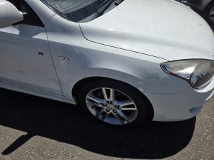 Hyundai I30 smash repair insurance job Dah Cheong Sydney white front right