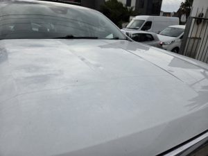 Ford Ranger XLT White Smash repair dents PDR Dah Cheong Sydney damage dent inspection