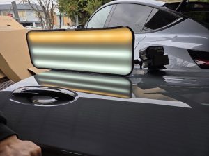Nissan Navara Uke gray PDR dent Repairs Dah Cheong Sydney light inspection