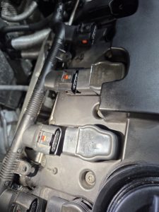 Volkswagen vw golf r spark plug maintenance and body work paint repair dah cheong sydney igitinion coil
