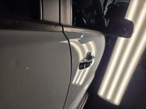 Ford Ranger XLT White Smash repair dents PDR Dah Cheong Sydney damage dent inspection