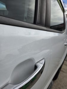 Ford Ranger XLT White Smash repair dents PDR Dah Cheong Sydney damage dent inspection