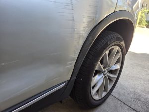 BMW X3 bronze smash repair dah cheong sydney left quarter damage