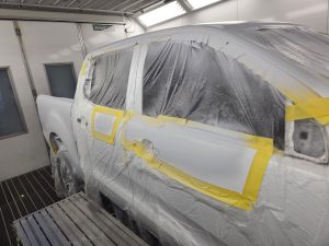 Ford Ranger XLT White Smash repair dents PDR Dah Cheong Sydney work in progress paint