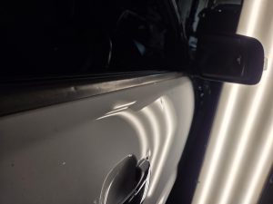 Ford Ranger XLT White Smash repair dents PDR Dah Cheong Sydney damage dent inspection