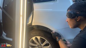 Audi Q3 white PDR dent repairs dah cheong sydney technician
