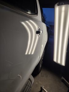 Ford Ranger XLT White Smash repair dents PDR Dah Cheong Sydney damage dent inspection