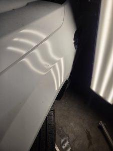 Ford Ranger XLT White Smash repair dents PDR Dah Cheong Sydney damage dent inspection