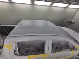Ford Ranger XLT White Smash repair dents PDR Dah Cheong Sydney work in progress paint