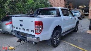 Ford Ranger XLT White Smash repair dents PDR Dah Cheong Sydney rear