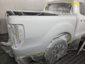 Ford Ranger XLT White Smash repair dents PDR Dah Cheong Sydney work in progress paint