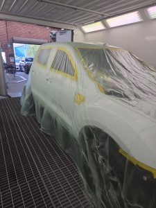 Ford Ranger XLT White Smash repair dents PDR Dah Cheong Sydney work in progress paint