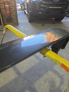 Ford Ranger XLT White Smash repair dents PDR Dah Cheong Sydney work in progress paint